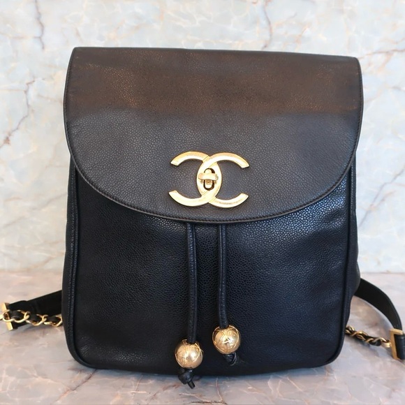 CHANEL Handbags - Authentic CHANEL black caviar leather backpack